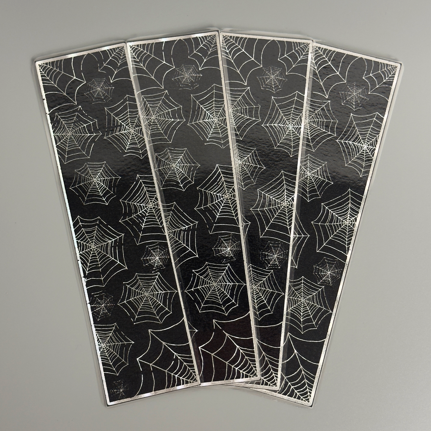 Holographic Spider Web Foiled Bookmark - A Web of Reading Wonder!