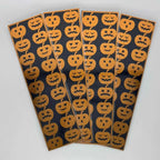 Halloween pumpkin stickers with spooky faces on black background
